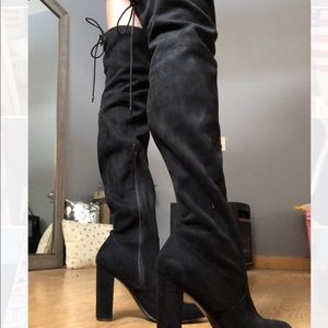Thigh high black heel boots